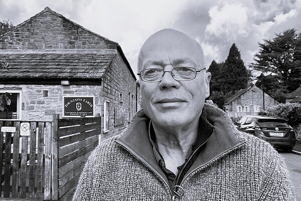 Councillor Murday outside Fountains Earth School, Lofthouse